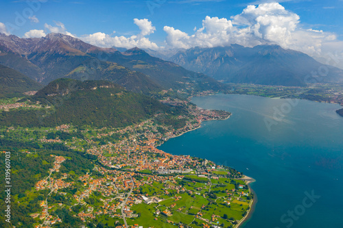 Lake Como with Alps Mountains on the Background. Travel Postcard Concept