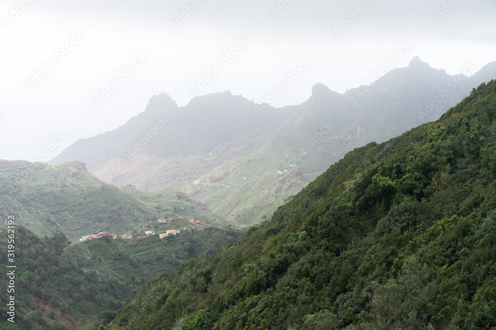 Beautiful green mountains in Anaga biosphere reserve with cloudy sky in the north of Tenerife, Canary islands, Spain Beautiful green mountains in Anaga biosphere reserve with cloudy sky in the north of Tenerife, Canary islands, Spain