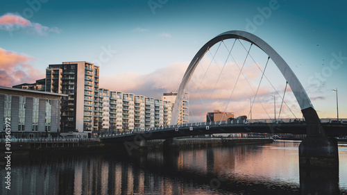Suspension bridge, The Clyde Arc, at sunset in the city of Glasgow photo