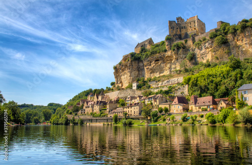 Approaching Beautiful Beynac on the River Dordogne, France photo