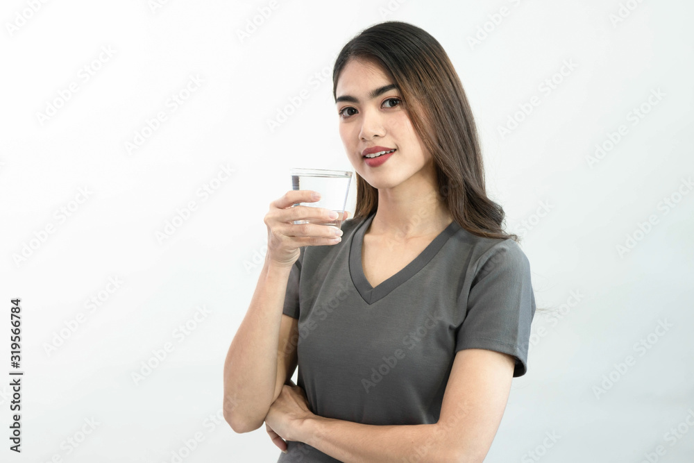 Young woman drink water isolated on white background Young woman drink water isolated on white background