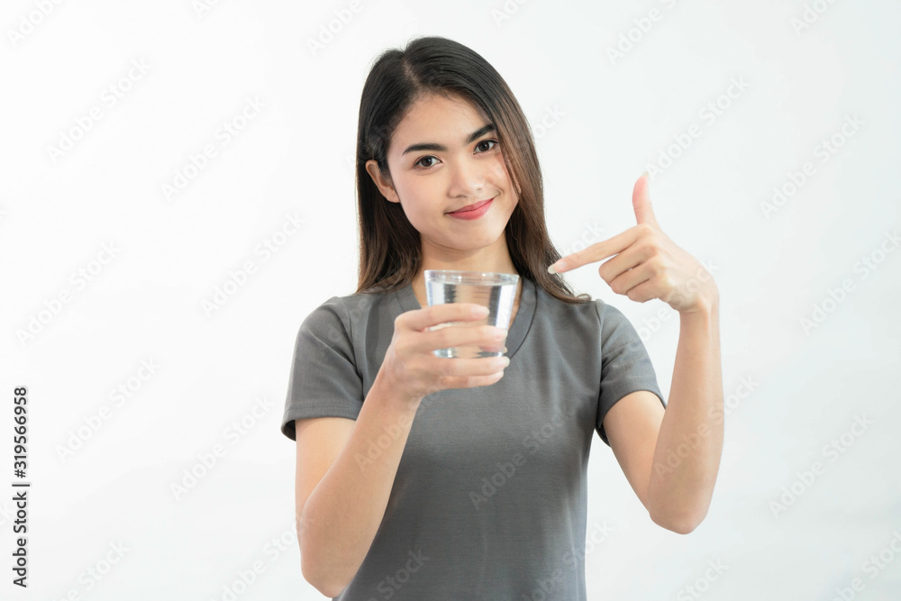 Young woman drink water isolated on white background Young woman drink water isolated on white background
