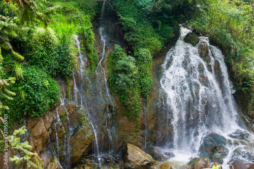 Silver waterfall at Cat Cat Village in Sapa Sapa Vietnam Indochina Asia. Waterfall landscape.