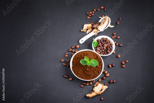 Mushroom Chaga Coffee Superfood Trend-dry and fresh mushrooms and coffee beans on dark background with mint. Coffee break