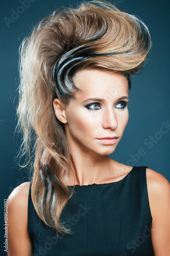 young elegant woman with creative hair style zebra print close up halloween stylish