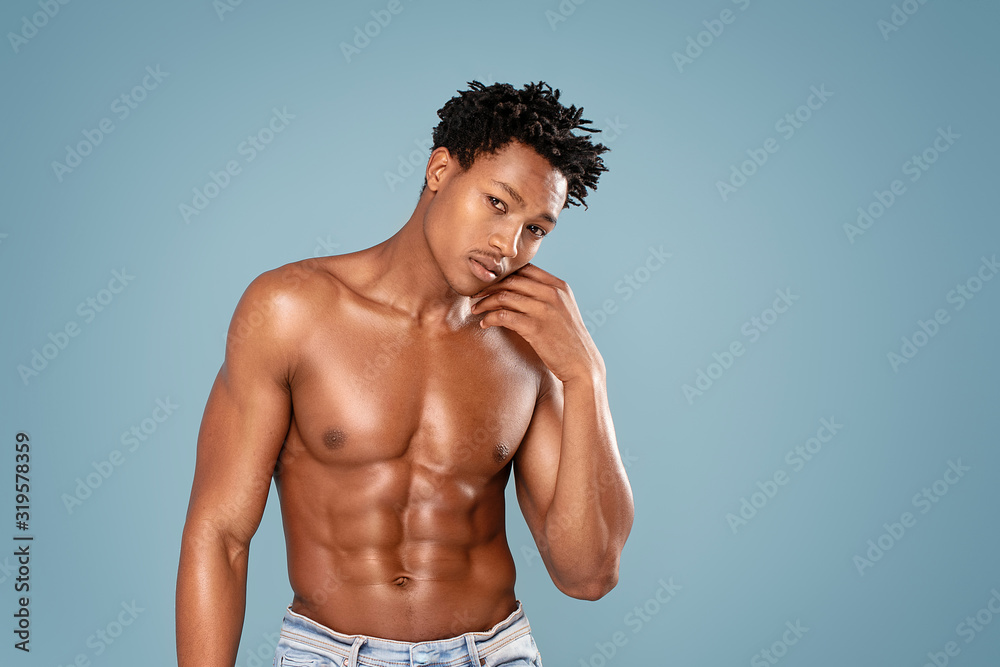 Fit african man with naked torso.