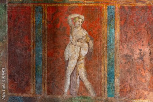 Italy, Pompeii, archaeological area, remains of the city buried by the eruption of ashes and rocks of Vesuvius in 79. Remains of the frescoes in the Villa of Mysteries