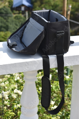 A Black Photography Bag With Strap