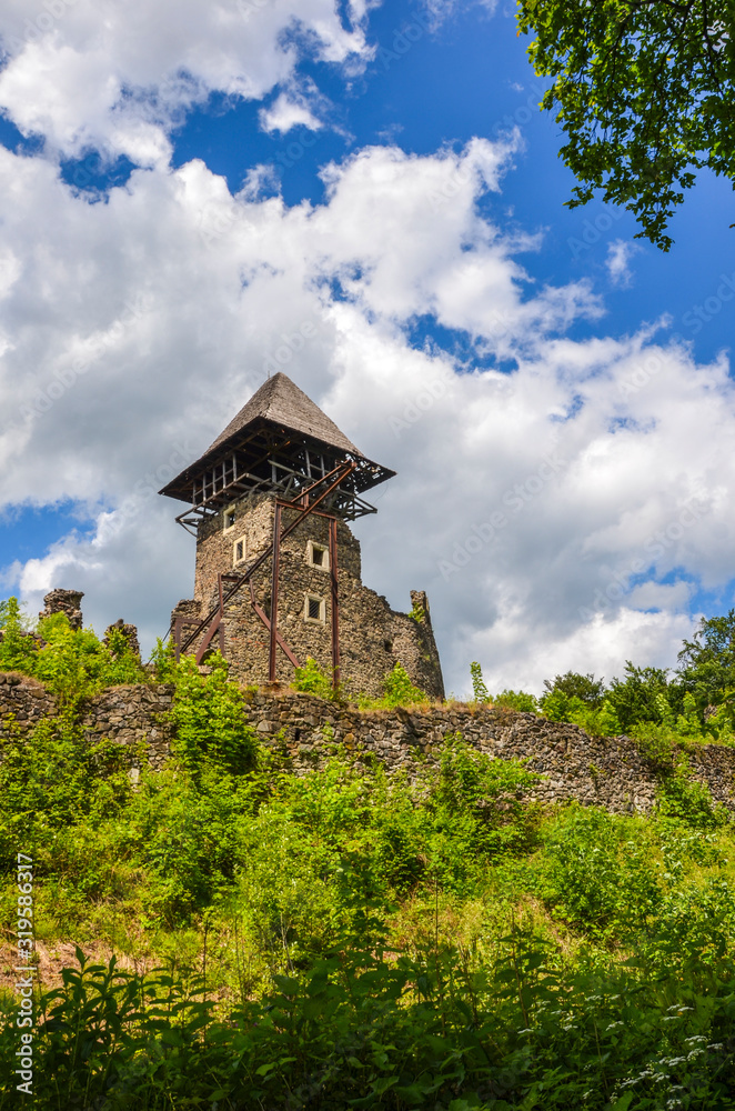 Ancient Nevytsky Castle ruined ruins on top of a mountain near of Transcarpathian region center, Uzhgorod attracts tourists in the West of Ukraine, surrounded by beech and oak forest, Ukraine Ancient Nevytsky Castle ruined ruins on top of a mountain near of Transcarpathian region center, Uzhgorod attracts tourists in the West of Ukraine, surrounded by beech and oak forest, Ukraine