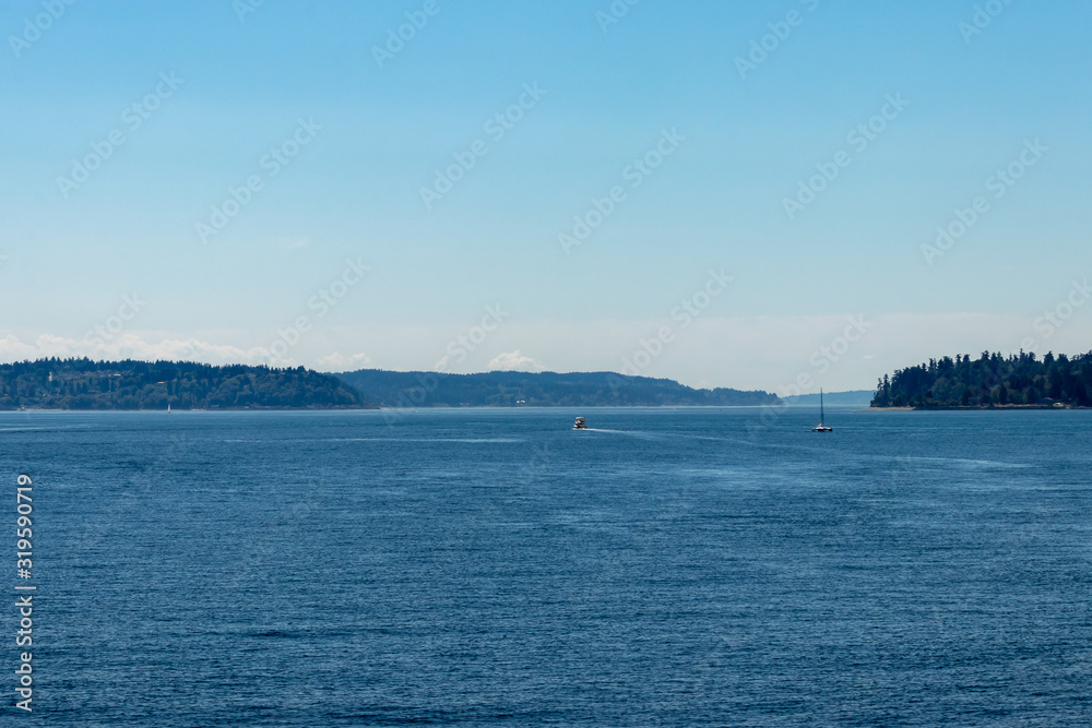 Puget sound on a spring day with blue water and land