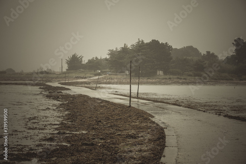 The road to the island at high tide. Creative sketches. Pictures for the interior.. Brittany. France