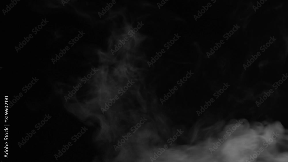 White smoke floating on isolated black background,water spray steam slow motion, Spooky element for halloween day White smoke floating on isolated black background,water spray steam slow motion, Spooky element for halloween day