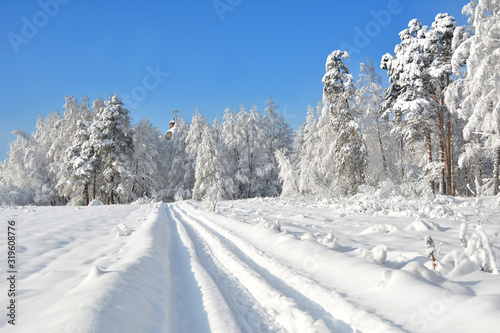 Russia. Snowy winter. Road to the monastery.