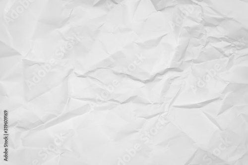 White crumpled paper texture background. Clean white paper. Top view. 