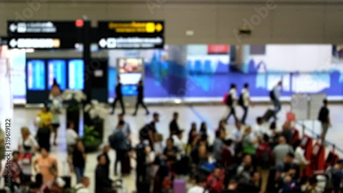 Wallpaper Mural Blurred and unrecognizable people are waiting to check in at the airport. Torontodigital.ca