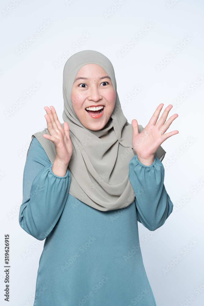 Muslim woman feeling extremely surprise. Muslim woman feeling extremely surprise.