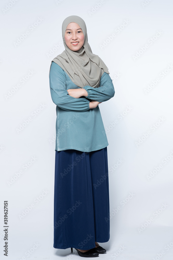 Beautiful muslim woman posing and smiling. Beautiful muslim woman posing and smiling.