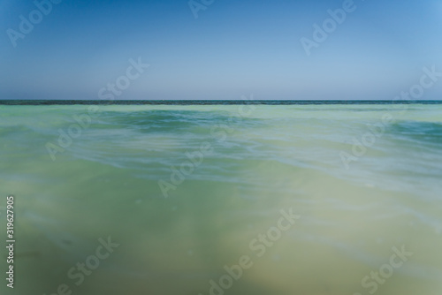 Ocean water on a beach in Cuba. 