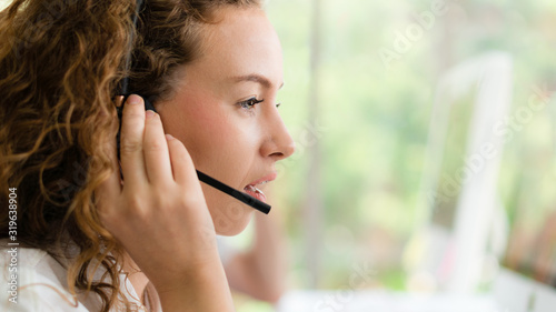 Schilderij op canvas business background of caucasian female call center agent on service with call f