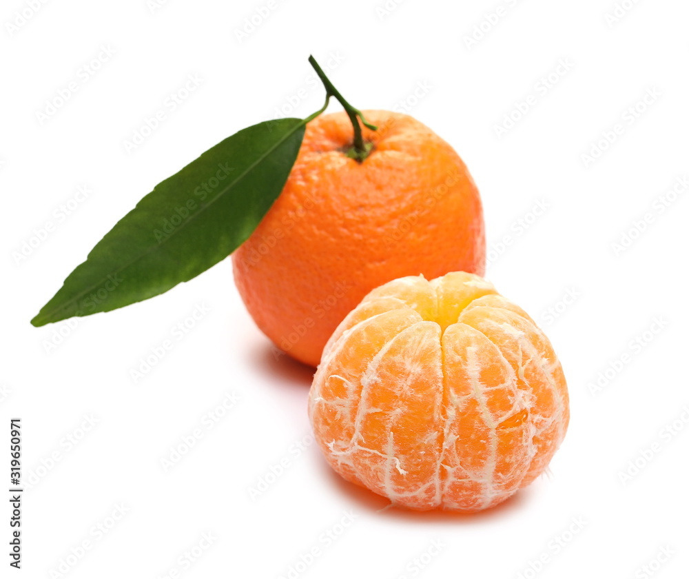 Mandarin with leaf and peeled pieces isolated on white background Mandarin with leaf and peeled pieces isolated on white background