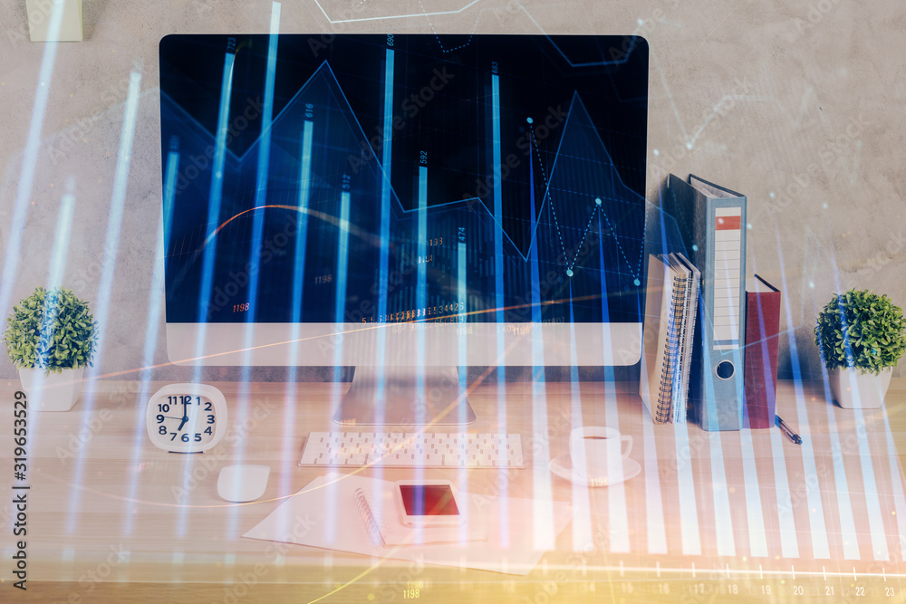 Forex graph hologram on table with computer background. Double exposure. Concept of financial markets. Forex graph hologram on table with computer background. Double exposure. Concept of financial markets.