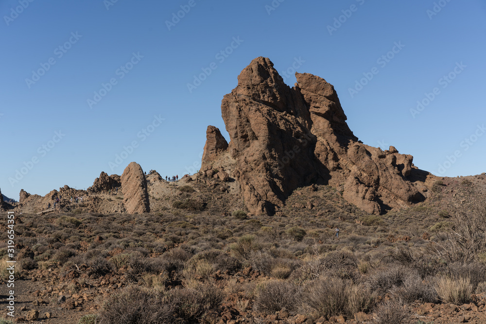 Obraz premium Roques de Garcia. The Roque Cinchado - a unique rock formation of the island of Tenerife located near Teide Volcano. Canary Islands, Spain