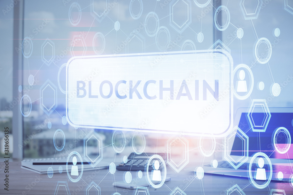 Double exposure of blockchain theme hologram and table with computer background. Concept of bitcoin crypto currency. Double exposure of blockchain theme hologram and table with computer background. Concept of bitcoin crypto currency.