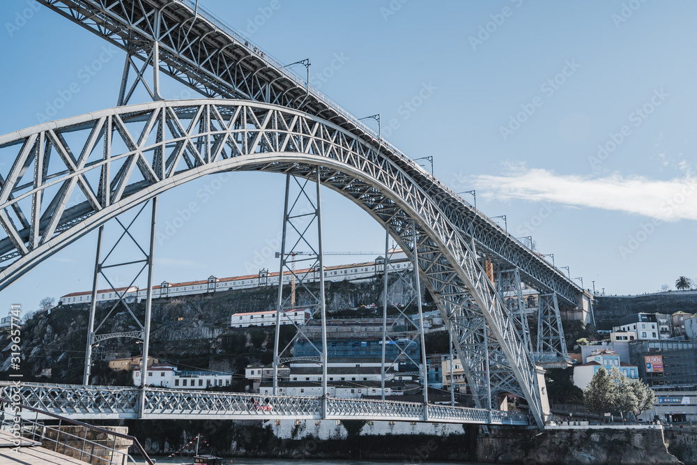 Dom Luis I bridge in Porto, Portugal against a blue sky in winter Dom Luis I bridge in Porto, Portugal against a blue sky in winter
