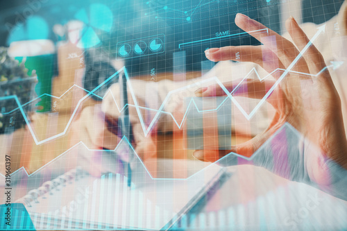 Forex chart displayed on woman's hand taking notes background. Concept of research. Multi exposure