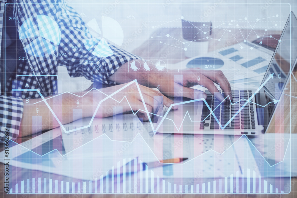 Multi exposure of stock market chart with man working on computer on background. Concept of financial analysis.