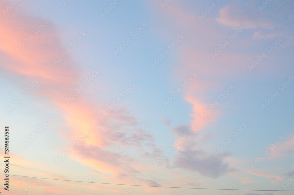 Blue sky with clouds dyed in pink Blue sky with clouds dyed in pink