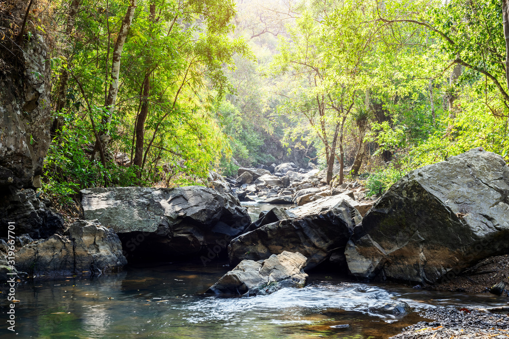 rocks in creek or stream flowing water rocks in creek or stream flowing water