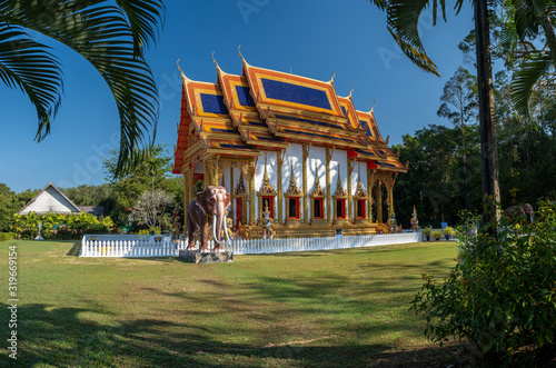 Khuk Khak Temple ,Khao Lak Thailand, Buddhist temple Khuek Khak Temple on a sunny day photo
