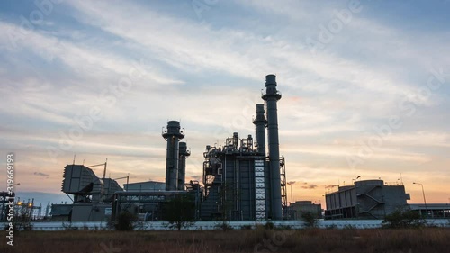Time lapse of Power plant at sunset. Gas turbine electrical power plant in industrial Estate.