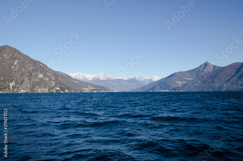 Lake Como with Snow-capped Mountain in Lombardy, Italy.