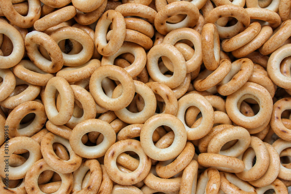 Background with a scattering of bread bagels and dries Background with a scattering of bread bagels and dries