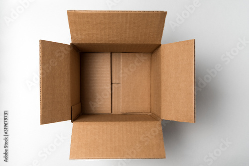 Fototapeta Naklejka Na Ścianę i Meble -  Square blank box opened on white background. Directly above