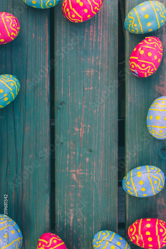 Chocolate Easter eggs, background, green wooden bench, different easter eggs lie on a green wooden bench, poster, wallpaper, postcard