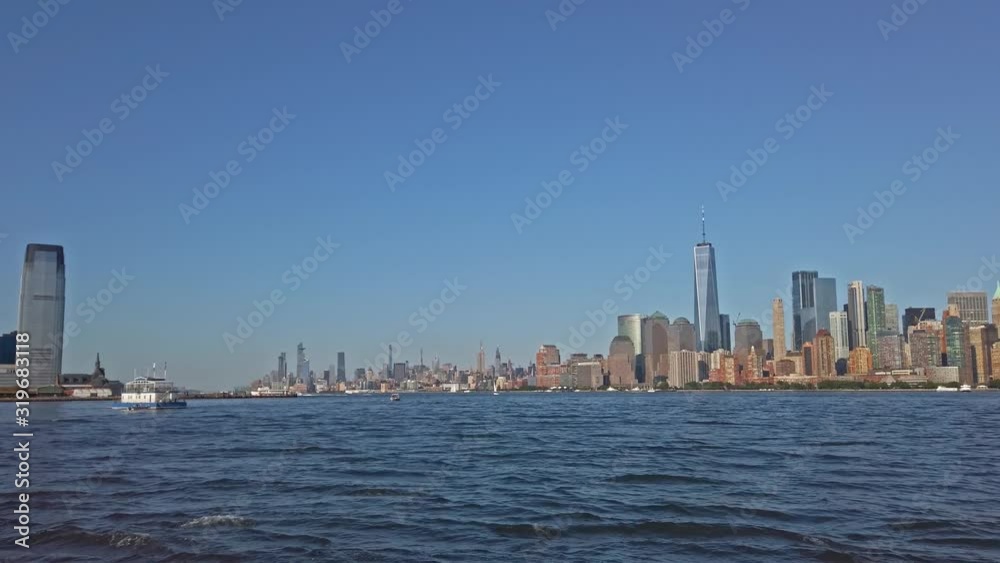 Touristic boat and Lower Manhattan panoramic view Touristic boat and Lower Manhattan panoramic view