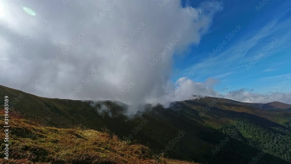 Low clouds in the mountains, time lapse