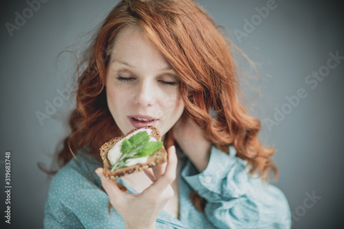 woman with hearb burger photo