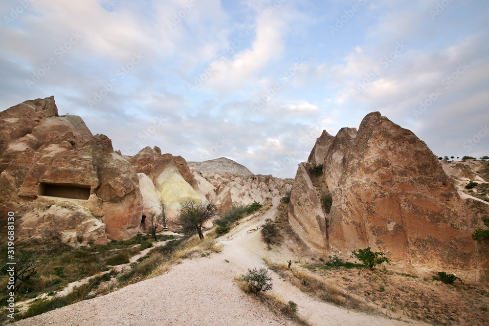 Fototapeta premium Unusual stones from volcanic rocks in the Red Valley near the village of Goreme in the Cappadocia region in Turkey.