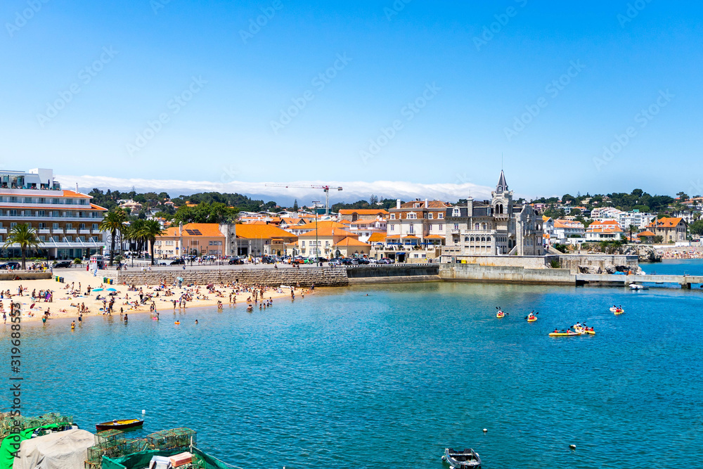 Aerial view  of a beach in Cascais city near Lisbon, Portugal. seaside town with beach, port and coastline panoramic view.