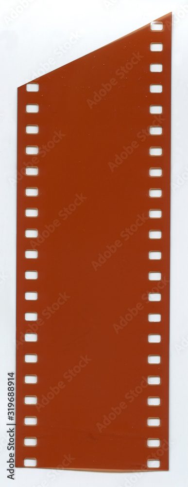 Fototapeta premium 35 mm orange film on a white background