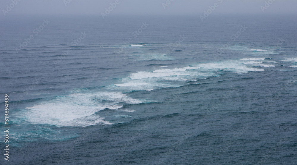 Cape Reinga Northland New Zealand. Where Tasman Sea and Pacific Ocean meet, collide.