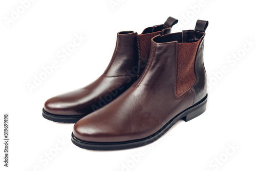 Shoes, chelsea leather boots for men. Male winter, autumn or spring fashion. Footwear isolated on white background. Sale photo