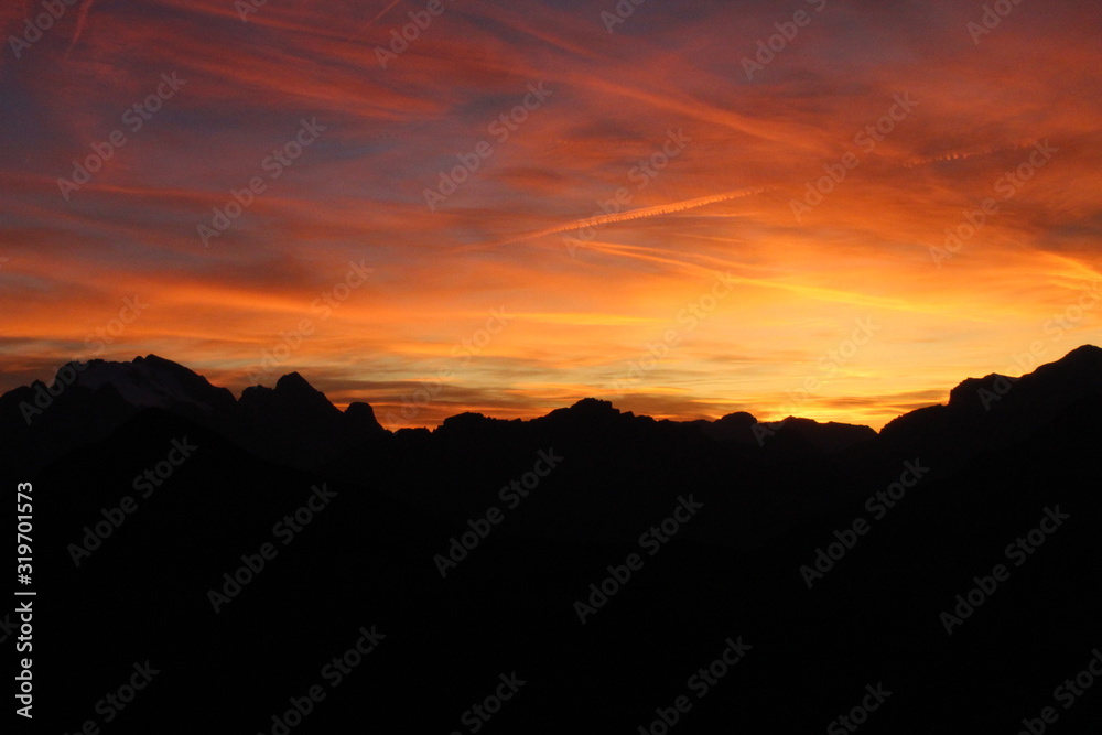 Obraz premium beautiful sunset view on the top of mountain