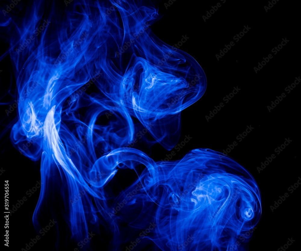 Obraz premium Blue smoke on black background