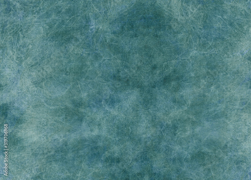 Fantasy mystic grunge background in blue-green tones of aquamarine color. Light scratches bizarrely intertwine in patterns, imitate cracks on ice. Beautiful unusual handcrafted texture