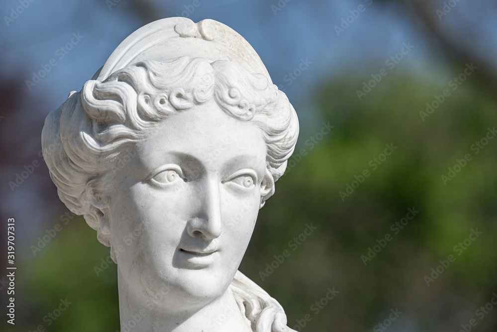 Old statue of a sensual naked Renaissance Era woman in the park of Potsdam, Germany, details, closeup Old statue of a sensual naked Renaissance Era woman in the park of Potsdam, Germany, details, closeup